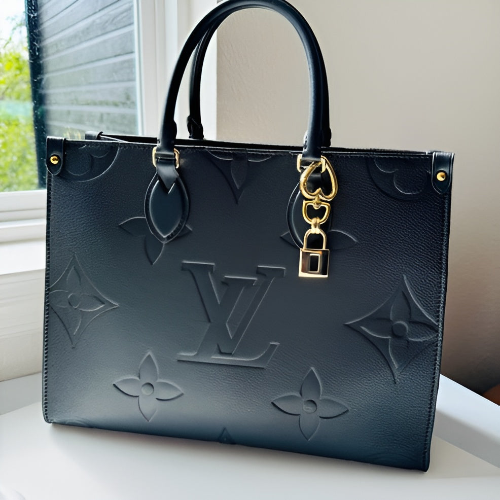 LOUIS VUITTON OnTheGo Monogram Empreinte Leather Handbag
