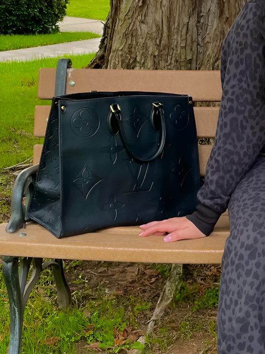 LOUIS VUITTON OnTheGo Monogram Empreinte Leather Handbag